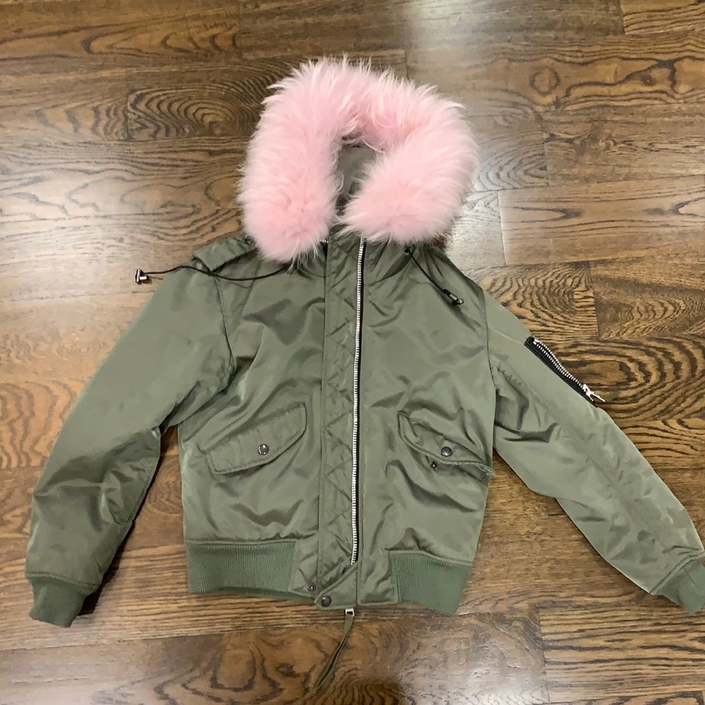 SAM. Sage colored jacket with pink fur hood.